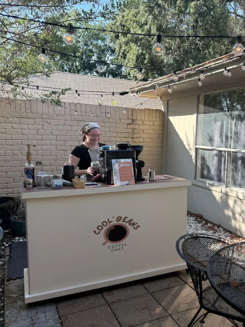 Backyard party espresso bar under string lights