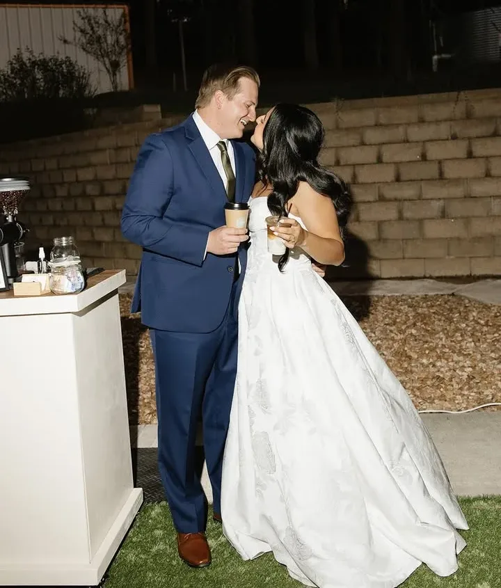 Wedding couple enjoying coffee from Cool Beans Coffee Cart